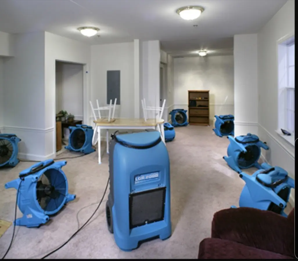Air movers and dehumidifier setup for Water Damage Restoration in Washington